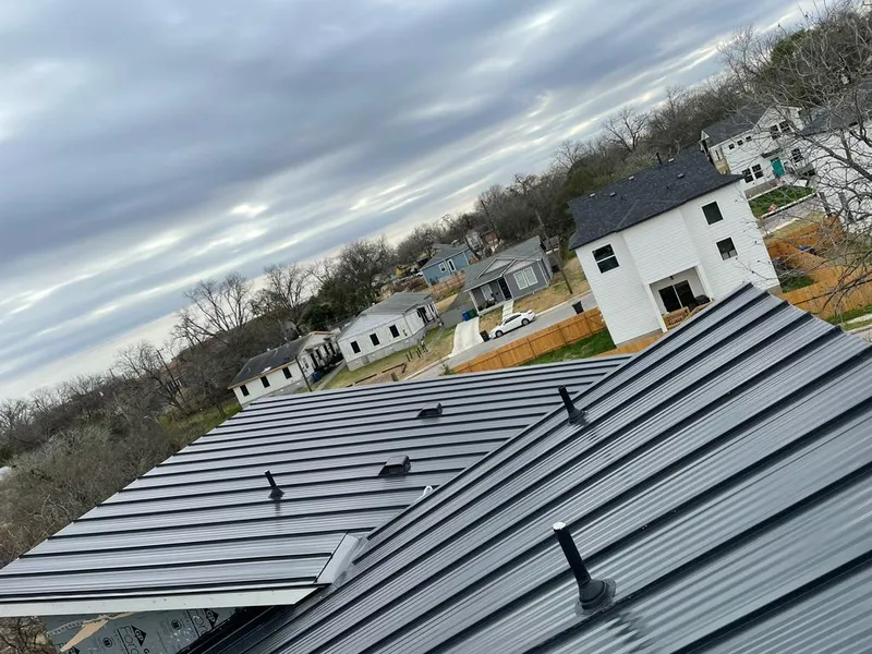 Standing seam metal roof panels with vents for Skylight Repair in Staunton